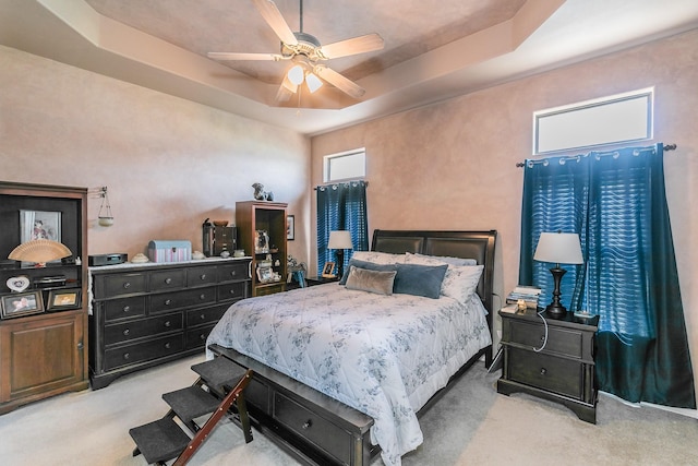 2516 Rushing Springs Dr, Fort Worth, TX 76118 - bedroom with carpet flooring, a raised ceiling, and ceiling fan
