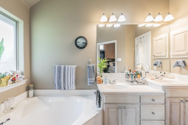 2516 Rushing Springs Dr, Fort Worth, TX 76118 - bathroom featuring ensuite bath, double vanity, and a garden tub