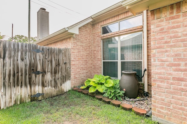 2516 Rushing Springs Dr, Fort Worth, TX 76118 - view of side of home featuring brick siding and a chimney