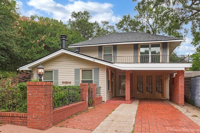 350 Albany Ave, Shreveport, LA 71105 - view of front facade featuring a balcony and roof with shingles