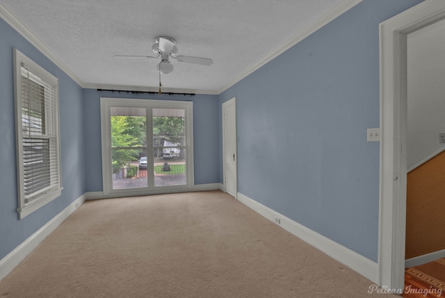 350 Albany Ave, Shreveport, LA 71105 - carpeted empty room featuring crown molding, a textured ceiling, ceiling fan, and baseboards