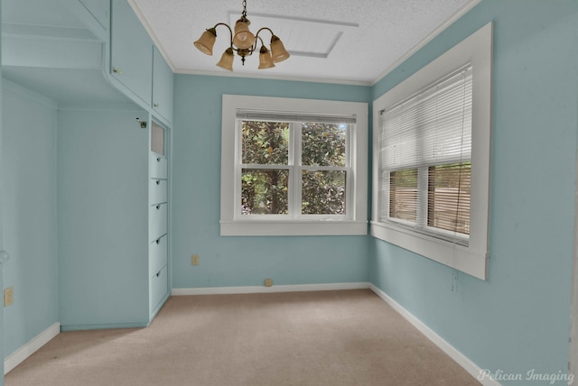 350 Albany Ave, Shreveport, LA 71105 - unfurnished room with light colored carpet, a textured ceiling, baseboards, and crown molding