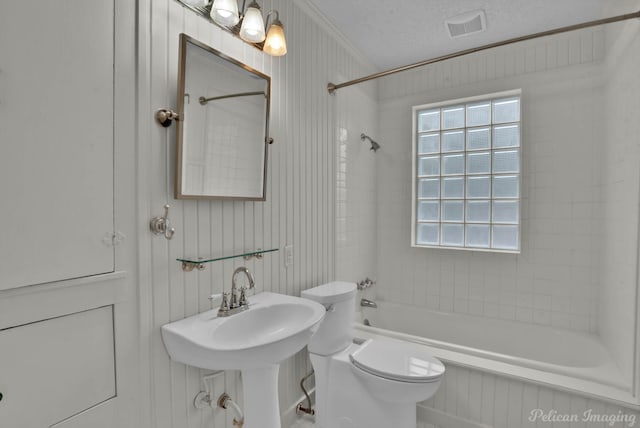 350 Albany Ave, Shreveport, LA 71105 - full bathroom featuring  shower combination, toilet, ornamental molding, and a textured ceiling
