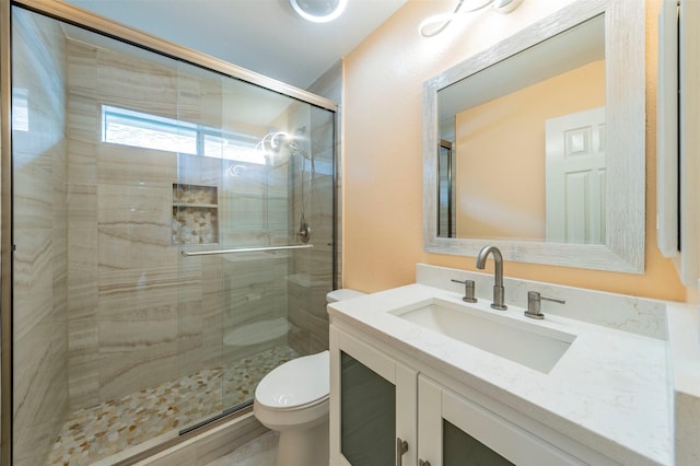 2231 Templeton Dr, Arlington, TX 76006 - bathroom with toilet, a stall shower, and vanity