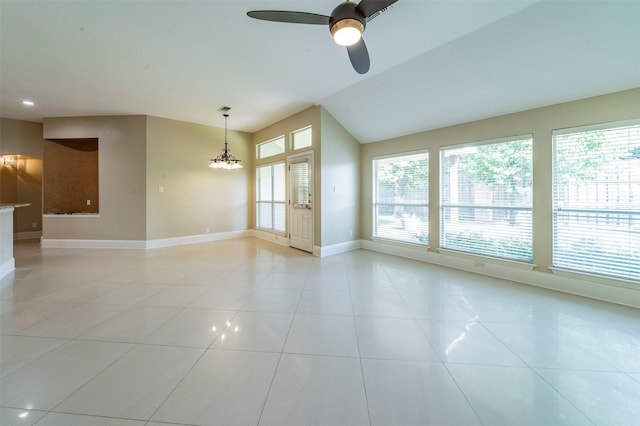 2231 Templeton Dr, Arlington, TX 76006 - unfurnished room with baseboards, a ceiling fan, light tile patterned flooring, a chandelier, and lofted ceiling