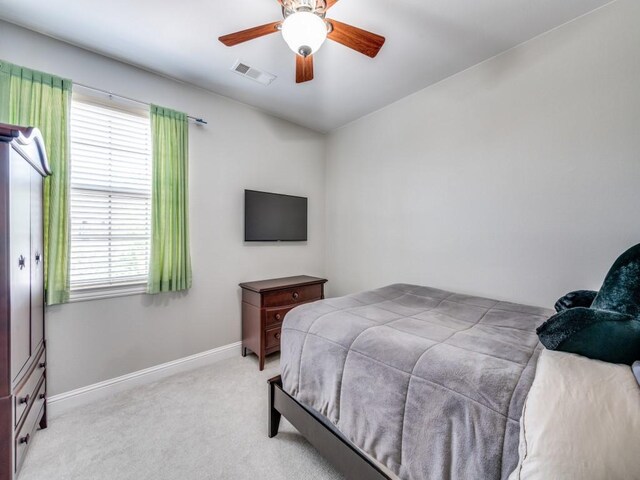 11483 Mirage Ln, Frisco, TX 75033 - bedroom with light colored carpet, baseboards, and a ceiling fan