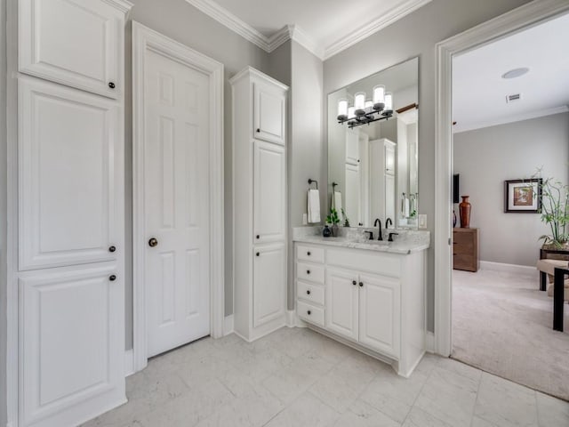 11483 Mirage Ln, Frisco, TX 75033 - bathroom featuring vanity, a chandelier, baseboards, crown molding, and marble finish floors
