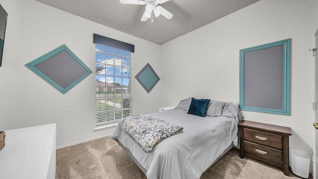 229 Willow Creek Dr, Weatherford, TX 76085 - carpeted bedroom with ceiling fan and baseboards