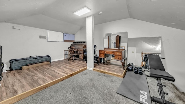 229 Willow Creek Dr, Weatherford, TX 76085 - exercise area with lofted ceiling and wood finished floors