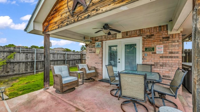 229 Willow Creek Dr, Weatherford, TX 76085 - view of patio / terrace featuring a ceiling fan, french doors, and outdoor dining area
