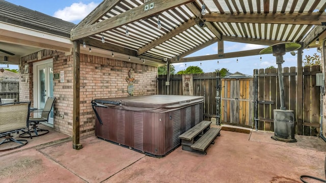 229 Willow Creek Dr, Weatherford, TX 76085 - view of patio featuring a hot tub and a pergola