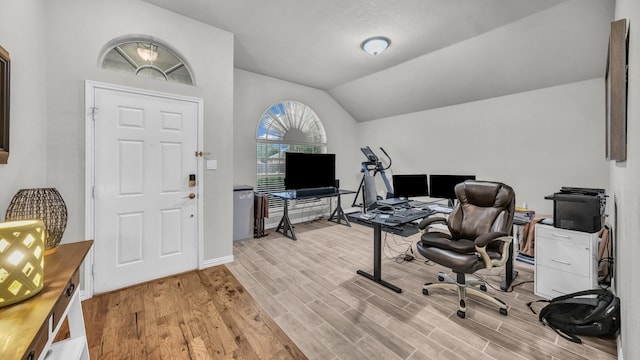 229 Willow Creek Dr, Weatherford, TX 76085 - office space featuring light wood-style floors, vaulted ceiling, and baseboards
