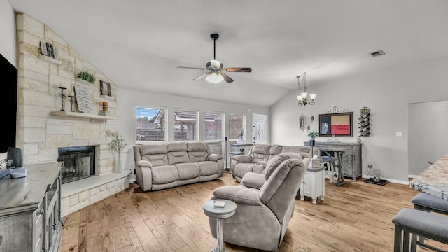 229 Willow Creek Dr, Weatherford, TX 76085 - living room featuring a fireplace, vaulted ceiling, a ceiling fan, light wood-type flooring, and baseboards