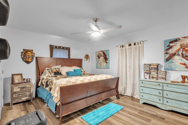 201 E Pearl St, Celeste, TX 75423 - bedroom featuring wood finished floors and ceiling fan