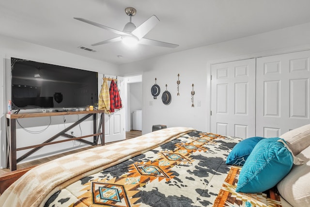 201 E Pearl St, Celeste, TX 75423 - bedroom featuring a closet, ceiling fan, and wood finished floors