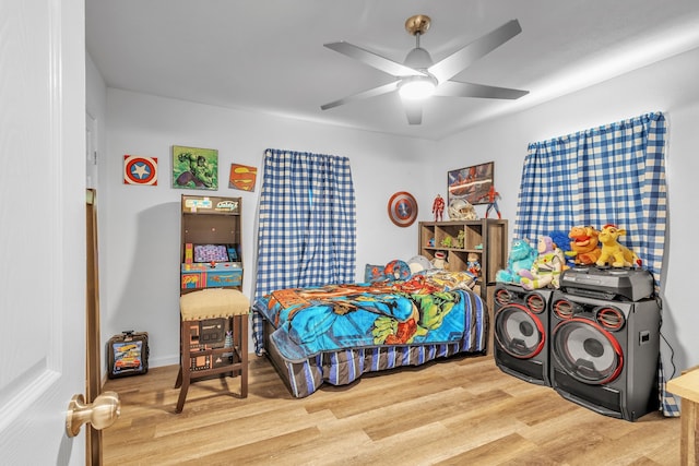 201 E Pearl St, Celeste, TX 75423 - bedroom featuring wood finished floors and ceiling fan