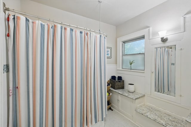 1425 W Gambrell St, Fort Worth, TX 76115 - bathroom featuring a wainscoted wall