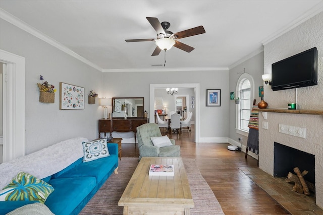 1425 W Gambrell St, Fort Worth, TX 76115 - living room with a chandelier, ceiling fan, wood finished floors, ornamental molding, and a tiled fireplace