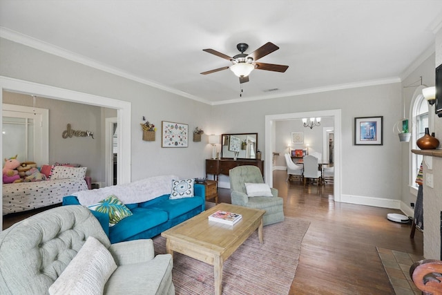 1425 W Gambrell St, Fort Worth, TX 76115 - living room with wood finished floors, a chandelier, ceiling fan, ornamental molding, and baseboards