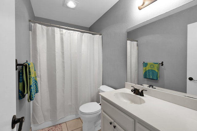 704 Windy Hl, Celeste, TX 75423 - full bath featuring vanity, toilet, and tile patterned flooring