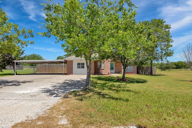 704 Windy Hl, Celeste, TX 75423 - view of front of property featuring brick siding, a carport, and driveway
