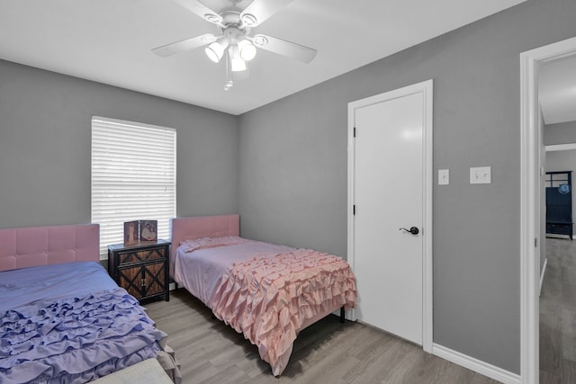 704 Windy Hl, Celeste, TX 75423 - bedroom featuring light wood-style floors and a ceiling fan