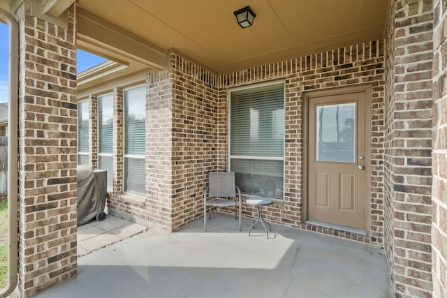 5420 Chinkapin Ln, Fort Worth, TX 76244 - property entrance featuring brick siding and a patio area