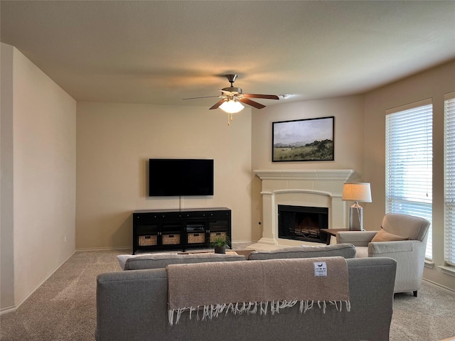 5420 Chinkapin Ln, Fort Worth, TX 76244 - carpeted living room with plenty of natural light, ceiling fan, a fireplace with raised hearth, and baseboards