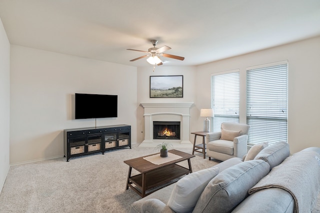 5420 Chinkapin Ln, Fort Worth, TX 76244 - carpeted living area featuring ceiling fan, a lit fireplace, and baseboards