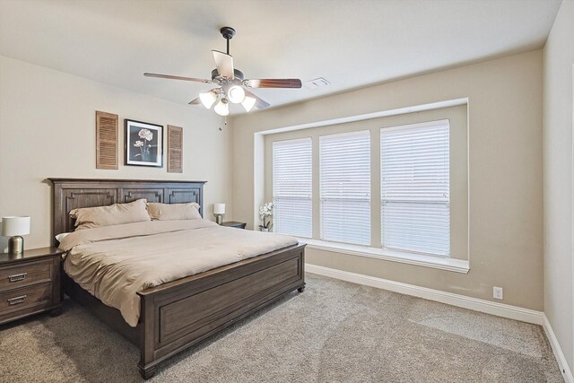 9117 Conroe Dr, Denton, TX 76226 - carpeted bedroom featuring baseboards and ceiling fan