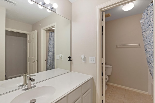 152 Leonard St, Lewisville, TX 75057 - full bath featuring toilet, vanity, tile patterned flooring, baseboards, and a shower with shower curtain