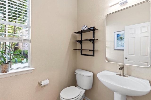 152 Leonard St, Lewisville, TX 75057 - half bathroom with toilet and a sink