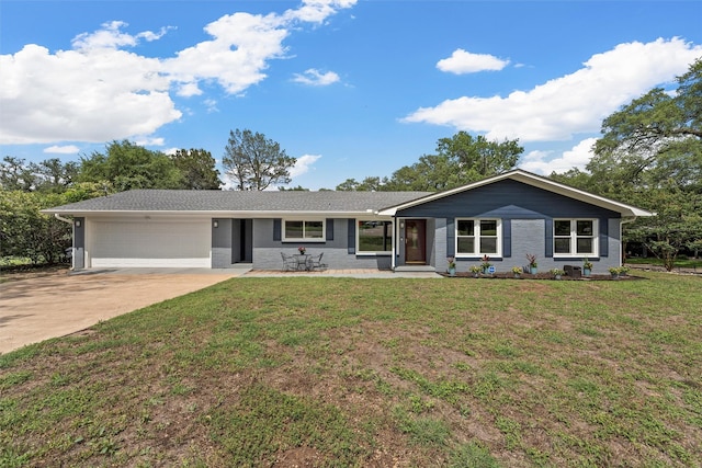 3917 N 31st St, Waco, TX 76708 - ranch-style home with an attached garage, driveway, a front lawn, and brick siding