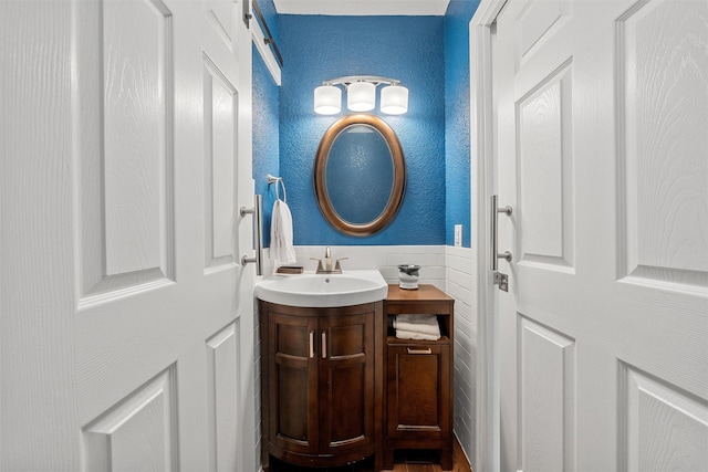 3917 N 31st St, Waco, TX 76708 - bathroom with vanity and a textured wall