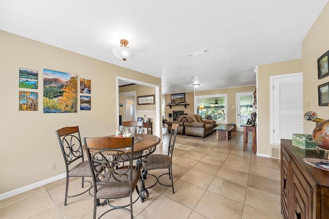 3917 N 31st St, Waco, TX 76708 - dining room with light tile patterned floors and baseboards