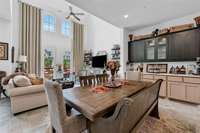 1134 Morgan Dr, Sherman, TX 75090 - dining space featuring stone finish flooring, ceiling fan, plenty of natural light, high vaulted ceiling, and recessed lighting