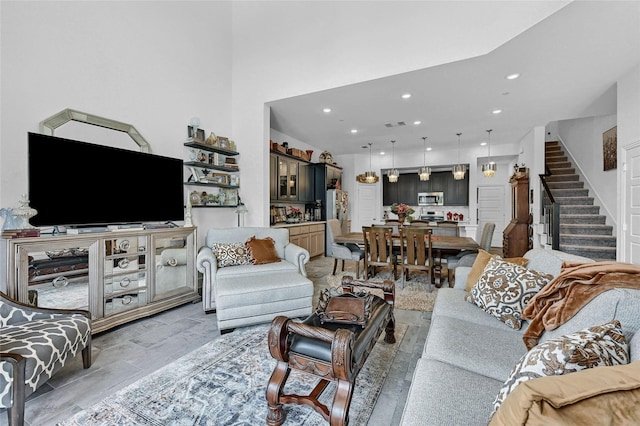 1134 Morgan Dr, Sherman, TX 75090 - living room featuring stairs and recessed lighting