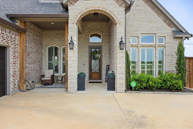 2141 Vanderbilt Dr, Weatherford, TX 76088 - doorway to property with stone siding and roof with shingles