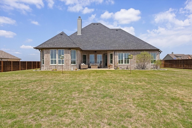 2141 Vanderbilt Dr, Weatherford, TX 76088 - back of property with brick siding, a chimney, outdoor lounge area, a patio, and a shingled roof