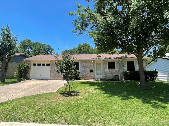 1229 Greenbrier Dr, Mesquite, TX 75149 - single story home with a garage, concrete driveway, brick siding, and a front yard