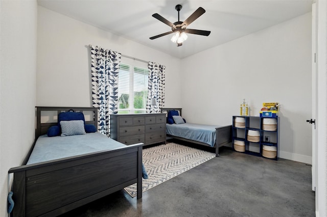 450 Cobb Ln, Waxahachie, TX 75167 - bedroom featuring finished concrete flooring, baseboards, and a ceiling fan