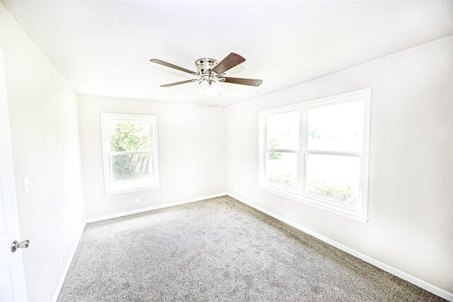 190 Trail Dr, Bowie, TX 76230 - empty room with baseboards, carpet, and ceiling fan