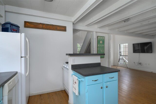 195 Cambridge Dr, Pottsboro, TX 75076 - kitchen with dark countertops, light wood-style flooring, baseboards, and white appliances