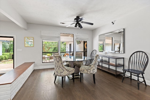 9402 Spring Hollow Dr, Dallas, TX 75243 - dining room with dark wood finished floors, baseboards, and ceiling fan