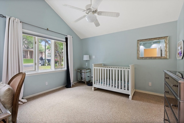 9402 Spring Hollow Dr, Dallas, TX 75243 - carpeted bedroom with vaulted ceiling, baseboards, a ceiling fan, and a nursery area