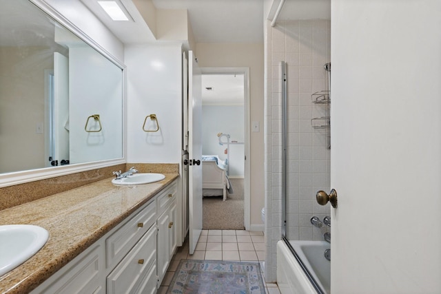 9402 Spring Hollow Dr, Dallas, TX 75243 - ensuite bathroom with double vanity, tile patterned flooring, and shower / tub combination