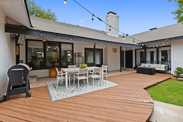 9402 Spring Hollow Dr, Dallas, TX 75243 - wooden terrace with outdoor lounge area and outdoor dining space