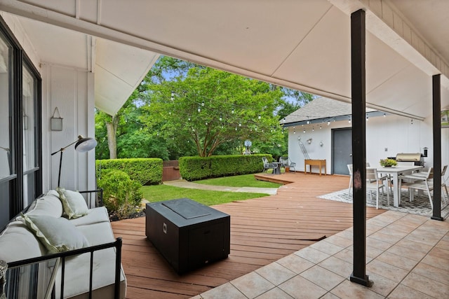 9402 Spring Hollow Dr, Dallas, TX 75243 - wooden deck featuring outdoor dining space and an outdoor hangout area