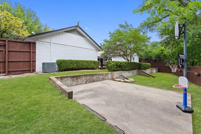 9402 Spring Hollow Dr, Dallas, TX 75243 - view of yard featuring a patio and central air condition unit