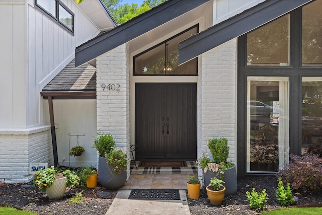 9402 Spring Hollow Dr, Dallas, TX 75243 - property entrance featuring brick siding